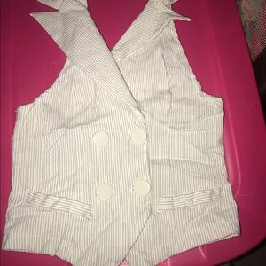 White vest with slim black stripes.